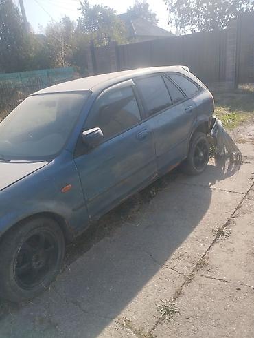 е 34 тарпеда сидения: Mazda 323: 2001 г., 1.6 л, Механика, Бензин, Универсал — 1