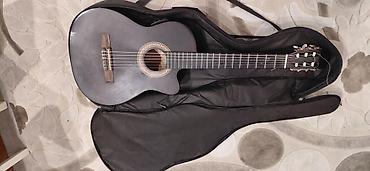Gitaralar: Klassik gitara – kəsikli (cutaway) korpuslu model. Rəng: tünd — 3