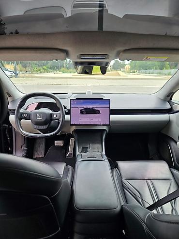 ağıllı dinamik: ZEEKR 001 – tam elektrikli fastbek kupe. Zərif qara rəngli kuzov — 7