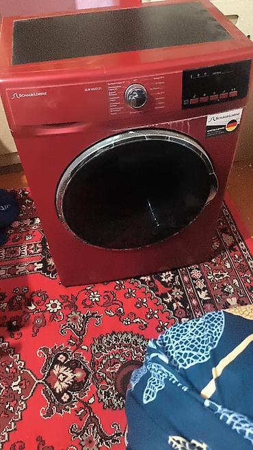 kontakt home ütü: Schadler Lorenz markalı ön yükləməli paltaryuyan maşın. Model üzərində — 1