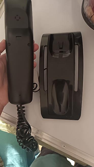 ağ evdəki telefon: LEBOSS stolüstü/çininə asılan simli telefon Xüsusiyyətlər: - Model — 2