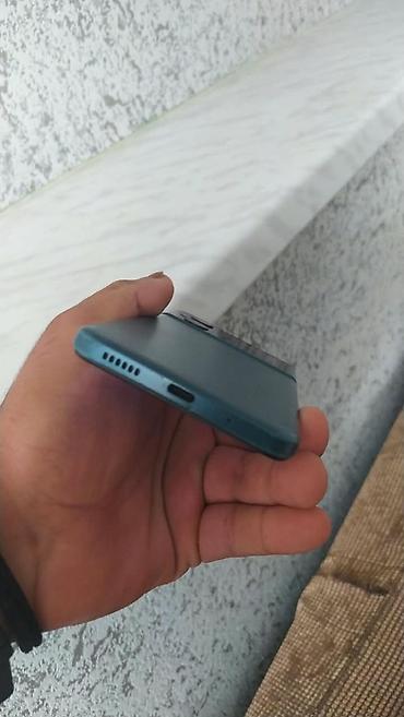 Poco M5, 128 GB, rəng - Mavi, Barmaq izi, Simsiz şarj, Face ID