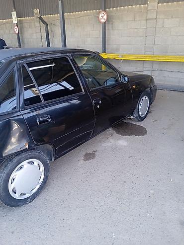 Транспорт: Daewoo Nexia: 2009 г., Седан — 4