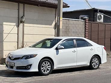 byd e2 2024: Toyota Camry: 2013 г., 2.5 л, Автомат, Гибрид, Седан — 1