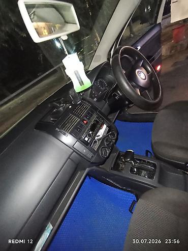каропка поло: Volkswagen Polo: 2004 г., 1.4 л, Автомат, Бензин, Хэтчбэк — 10