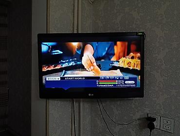 Televizorlar: LG LCD/LED televizor, divara montajlı. - Ekran ölçüsü: təxminən 32" — 2