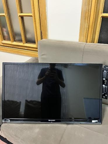 Televizorlar: Sharp LED televizor Xüsusiyyətlər: - Ekran: təxminən 32–40 düym — 1