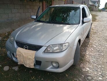 мазда кроссовер: Mazda 323: 2003 г., 2 л, Механика, Бензин, Хэтчбэк