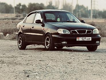 mg zs 2024: Chevrolet lanos 2008 manual, черный цвет кузова. 4 двери, передний — 1