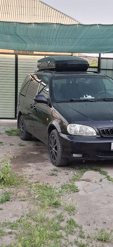 холодильник авто: Kia Carnival: 2000 г., 2.5 л, Автомат, Газ, Минивэн — 1