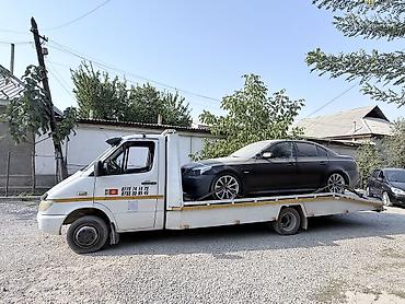 Услуги эвакуатора: С лебедкой, С ломаной платформой, С жёсткой сцепкой — 28