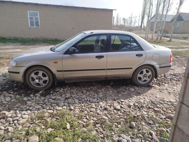 яапошка машина: Mazda 323: 1999 г., 2 л, Механика, Бензин, Седан