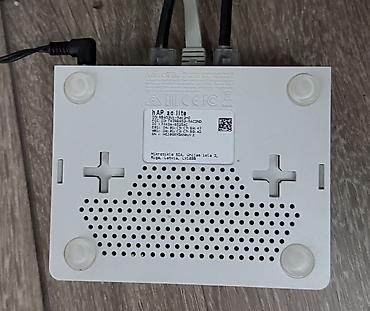 Модемы и сетевое оборудование: Маршрутизатор MikroTik RouterBOARD hAP ac lite (RB952Ui-5ac2nD) - — 2