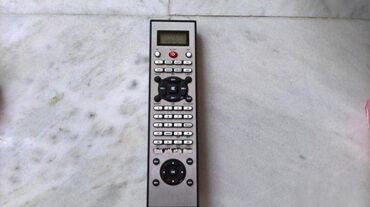 Aksesoari za TV i video: 1. Universal-daljinski 10in1 Modell CL53E 2. 4 in 1 daljinski — 1