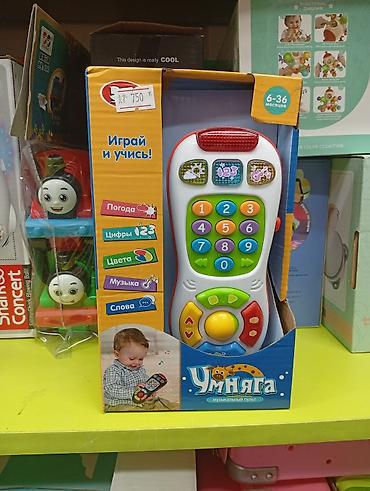 месяц: Детская обучающая игрушка «Умняга» — музыкальный пульт - Возраст — 2