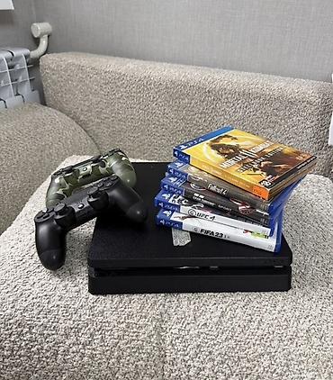 Игровая консоль Sony PlayStation 4 Slim (черная) с комплектом