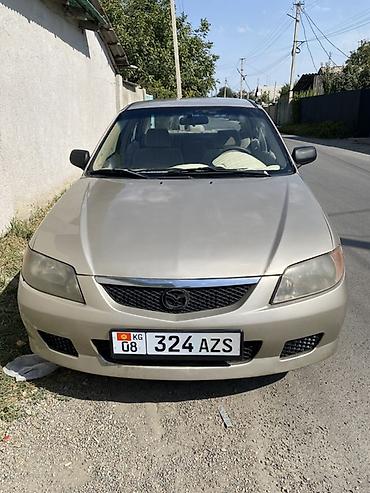 mazda 2004: Mazda 323: 2003 г., Автомат, Бензин, Седан — 2