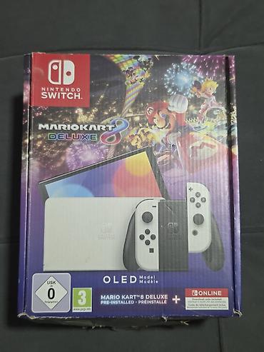 kacenje tv na gipsani zid: Nintendo Switch OLED – Mario Kart 8 Deluxe bundle (bela verzija) - — 2