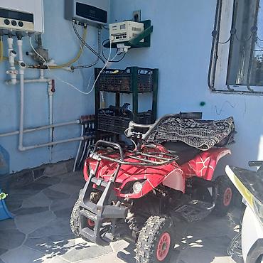 das utu: Uşaq üçün elektrikli kvadrosikl. Qırmızı rəngli, 4 təkərli uşaq — 1