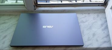 Planşetlər: ASUS noutbuk - Model xətti: ASUS Laptop (üst qapaqda ASUS loqosu) -