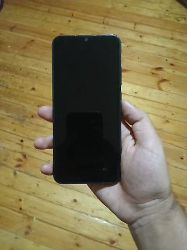 телефон fly fs520 selfie 1: Redmi 12C, 128 ГБ, цвет - Черный, Отпечаток пальца — 1