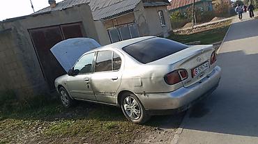 Унаа: Nissan Sunny: 2001 г., 1.6 л, Кол менен иштөөчү, Бензин, Седан — 7