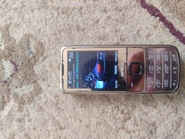 телефон сокулук: Nokia 6700 Slide, Колдонулган, түсү - Алтын, 1 SIM