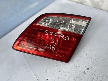 w21: Задний левый фонарь (левое наружное крыло) для Nissan Cefiro — 1