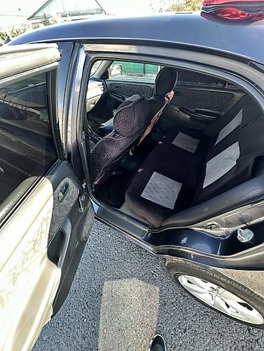 fix look: Mazda 626: 1998 г., 2 л, Механика, Бензин, Хэтчбэк — 7