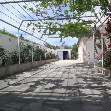 Ütüləmə lövhələri: Həyət evi üçün nəzərdə tutulmuş bu metal konstruksiya, üzüm tənəkləri