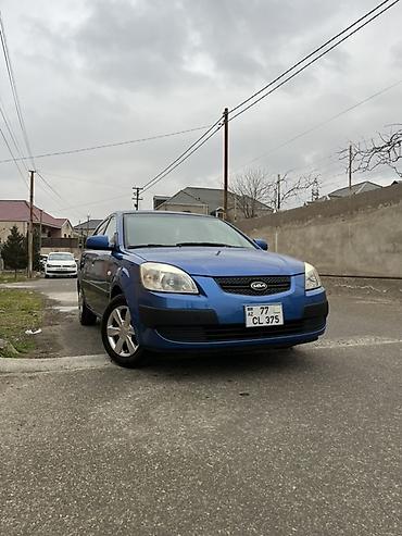 Kia: Kia Rio hatchback - Kuzov: 5 qapılı hatchback, mavi rəng - Mühərrik — 8