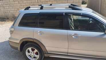 Mitsubishi: Mitsubishi Outlander: 2.4 l | 2006 il 394000 km Krossover — 3