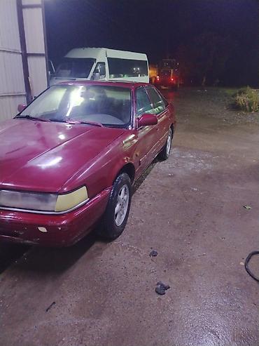Oldsmobile: Mazda 626: 1990 г., Кол менен иштөөчү, Бензин, Седан — 4