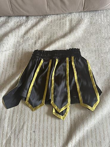 Ətəklər: Kik boks Muay Thai ucun sacaqli sortik alinma deyil tikilme el isidr — 2