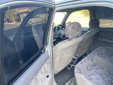 мд регион: Nissan March: 1998 г., 1.3 л, Автомат, Бензин, Универсал — 6