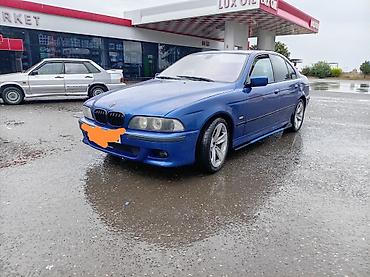 bmw spoler: BMW 5 Seriyası (E39) sedan – mavi rəngdə. Xüsusiyyətlər: - Geniş və — 1