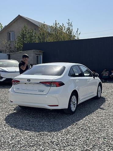 spark 2018: Toyota Corolla: 2019 г., 1.8 л, Вариатор, Гибрид, Седан — 7