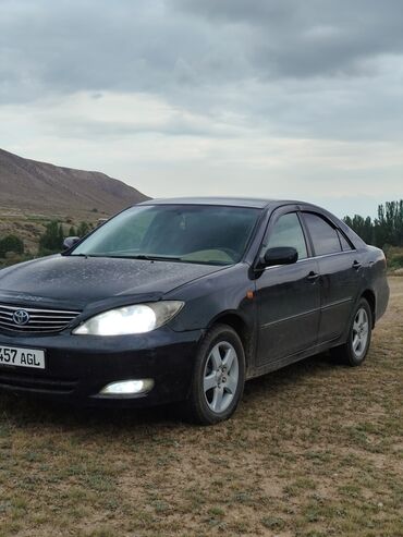 диски на опель зафира а: Седан Toyota Camry, отличающийся элегантным черным кузовом и стильными