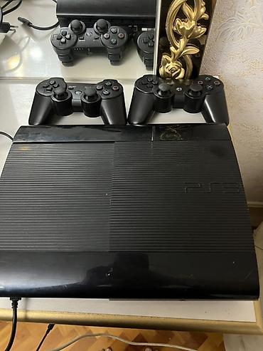 ps3 süper slim: PlayStation 3 Super Slim oyun konsolu - Model: PS3 Super Slim (üst — 1
