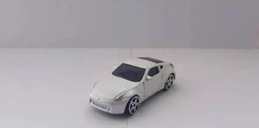 mokuru oyuncaqları: Təcili Satılır. Endirim Var. Nissan 370z Cupe modelka satılır.Ağ