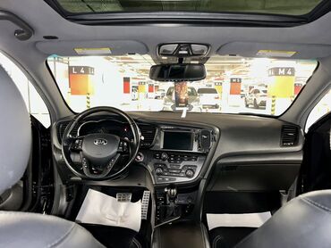 Kia: Kia Optima – qara rəng, sedan kuzov. Şəhərdaxili və magistral yollarda — 13