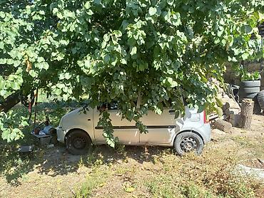 Унаа: Opel Agila: 2004 г., 1 л, Кол менен иштөөчү, Бензин, Хетчбек — 2