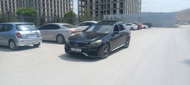 рулевая рейка w210: Черный седан Mercedes-Benz E-класса, модель E 63 AMG. Автомобиль