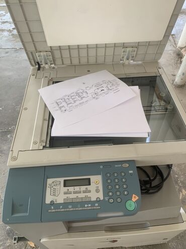 dell notebook adapter: Ağ rəngli ofis çoxfunksiyalı printer. Bu, çap, surət çıxarma və skan