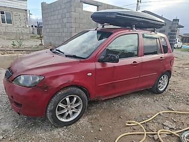 range over: Mazda Demio: 2002 г., 1.3 л, Бензин — 3