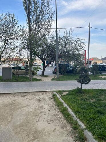 Kommersiya daşınmaz əmlakının satışı: Köhnə Günəşlidə əsas yolun kənarında, 9 mərtəbəli binanın — 7