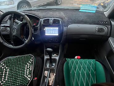 Haima: Mazda Familia: 1999 г., 1.5 л, Автомат, Бензин, Хэтчбэк — 4