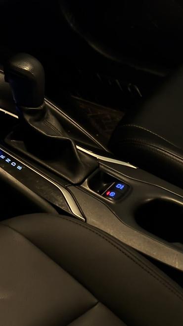 электра машына: Toyota Corolla: 2019 г., 1.8 л, Гибрид, Седан — 8