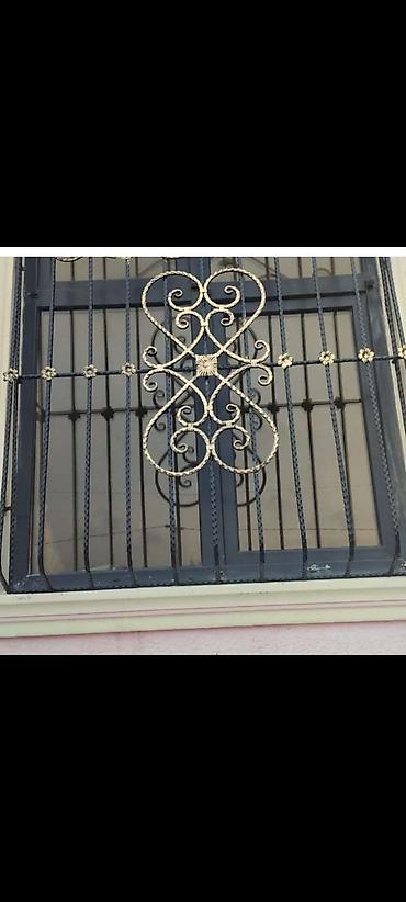 Barmaqlıqlar: Pəncərələr üçün qızılı rəngdə, dəmir barmaqlıqlar. Dekorativ — 2