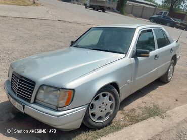 мерседес 210 салон: Серебристый седан Mercedes-Benz E-класса (W124) с характерным дизайном